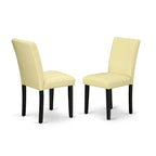 A Round Kitchen Table and Eggnog Faux Leather Chairs, Black